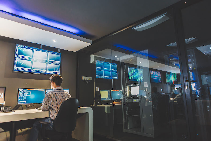 Security Cleared ICT and Cyber, man working in security operations centre as part of our jobs in Canberra